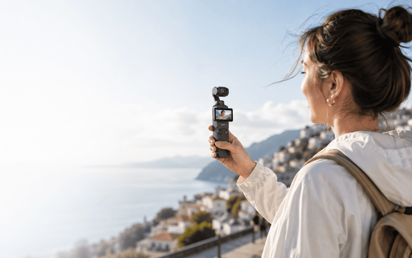 Creator filming with a compact rental camera